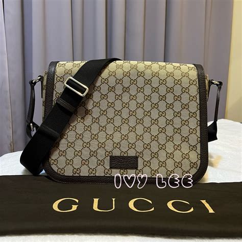 【GUCCI 古馳】Guccissima GG 帆布皮革飾邊郵差包(咖啡色).